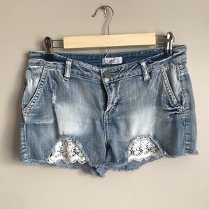 Cut off jean shorts with crochet details